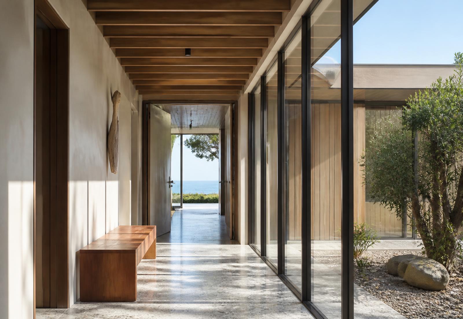 Glazed connecting walk between two building volumes
