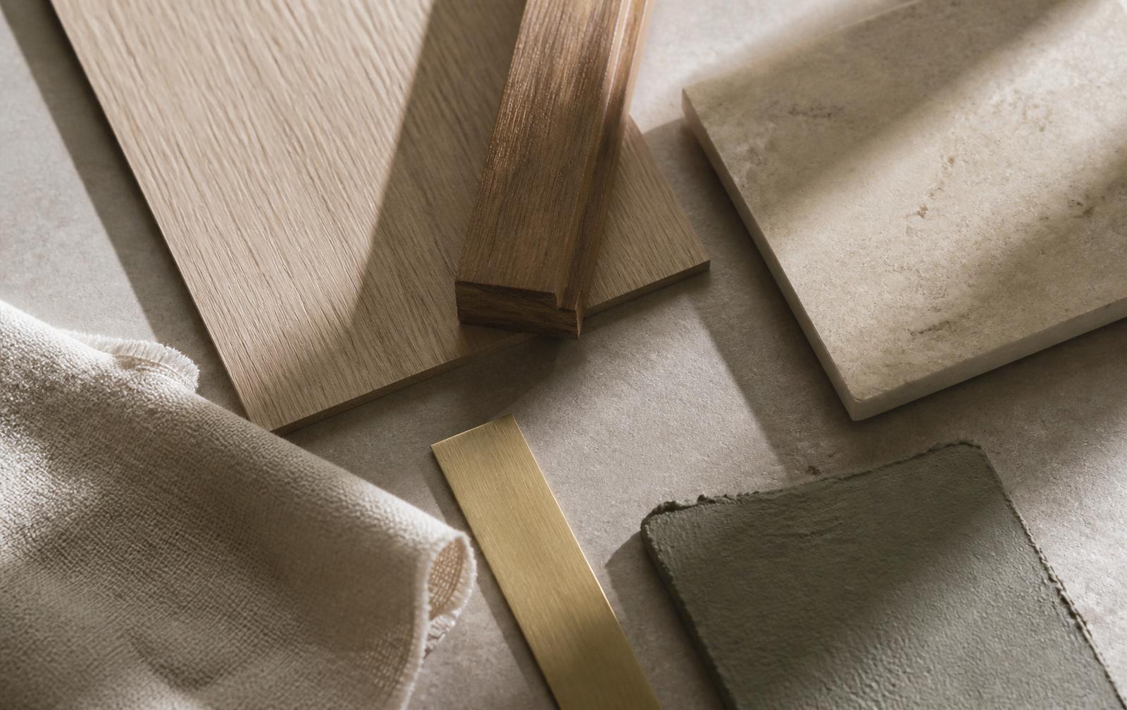 Concept material palette: oak, cedar, limestone, olive plaster, brass, linen